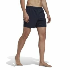 Mens Short Length Solid Swim Shorts 11 Mens Short Length Solid Swim Shorts -ALLENS SWIMWEAR Sales hp1774 5 apparel on model walking view white